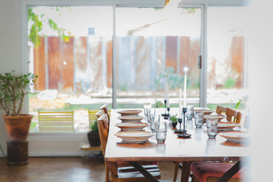 Dining room - mid-century modern dining room idea in Austin