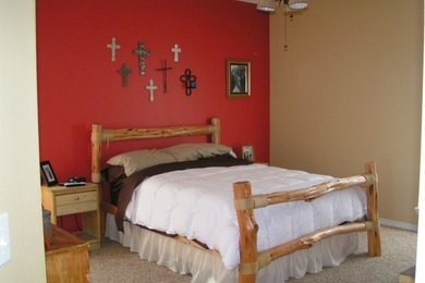 Inspiration for a mid-sized guest carpeted bedroom remodel in Austin with red walls