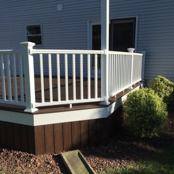 Trex Transcend decking, Picture frame, white trim, vinyl railings