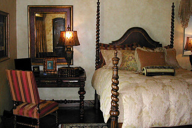 Tuscan master dark wood floor bedroom photo in Orange County with multicolored walls
