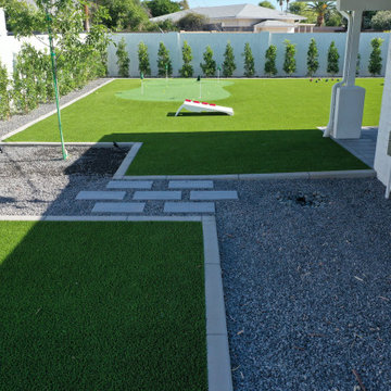 Side yard with putting green