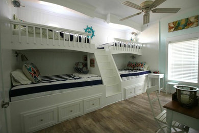 Example of a beach style bedroom design in Houston