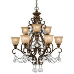 Crystorama - Norwalk 9 Light Clear Italian Crystal Bronze Umber Chandelier - Bronze curves accent warm glowing amber colored glass globes. The Norwalk radiates with romantic elegance, for a traditional yet hospitable accent. This chandelier makes a great first impression in a front stairwell, entry, or formal dining room.