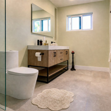 AFTER: NEW WALK-IN SHOWER WITH PEBBLE-STONE FLOOR