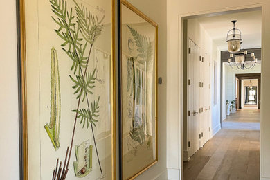 Example of a large classic hallway design in Sacramento with white walls