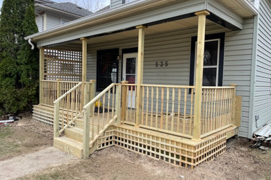 This is an example of an industrial porch design in Other.