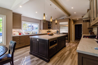 Inspiration for a large craftsman kitchen remodel in Los Angeles with an island