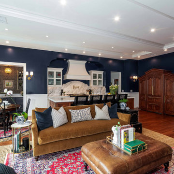 Traditional Open Concept Living Room and Kitchen with Navy Walls and Marble Rang