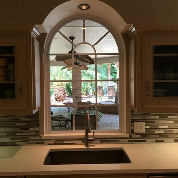 Kitchen with extended backsplash