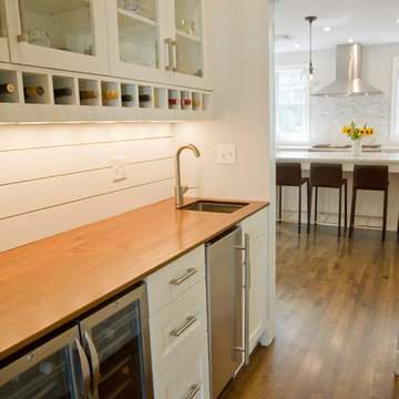 Sunny kitchen expansion with mudroom, pantry and half bath