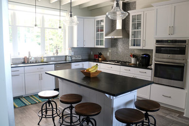 Example of a beach style kitchen design in Other