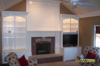 family room cabinets and mantel