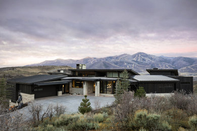 Huge trendy two-story house exterior photo in Salt Lake City