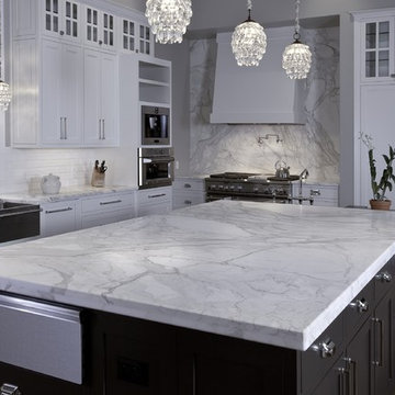 Artisan Stone Collection granite huge island in Calacatta Gold marble