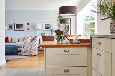Home design - mid-sized traditional home design idea in West Midlands
