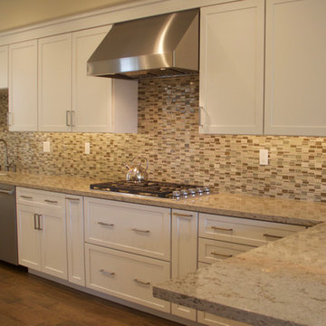 Relocated Kitchen Peninsula Sink Creates Expansive Open Kitchen