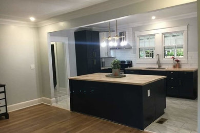 Example of a classic kitchen design in Other