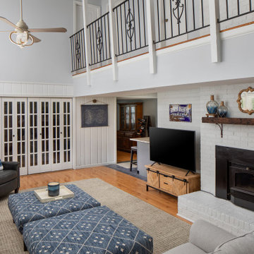 White Vaulted Ceiling Family Room