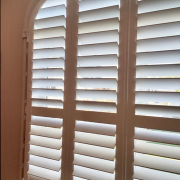 Challenging Arch Top Window in Master Bedroom with Oriental Influence
