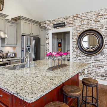 Painted Cabinets and New Brick Accent Wall!