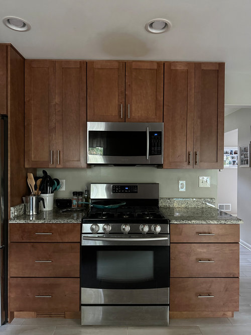 Swapping freestanding range for slidein range granite gap