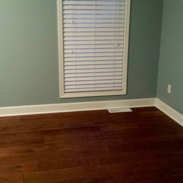 White Family Dining Room featuring Hallmark Floors Alta Vista Carmel Oak