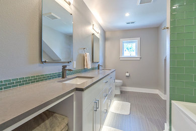 Alcove bathtub - large contemporary master green tile and porcelain tile porcelain tile and gray floor alcove bathtub idea in Portland with shaker cabinets, white cabinets, a two-piece toilet, gray walls, an undermount sink and solid surface countertops
