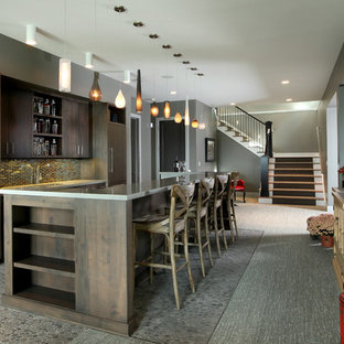 Inspiration for a large contemporary walk-out basement in Grand Rapids with grey walls, no fireplace and ceramic flooring.
