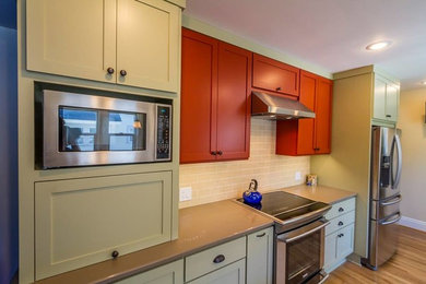 Inspiration for a mid-sized transitional bamboo floor eat-in kitchen remodel in Portland with shaker cabinets, beige cabinets, quartz countertops, ceramic backsplash, stainless steel appliances, no island and a farmhouse sink