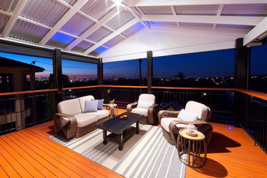 This is an example of a contemporary deck in Brisbane.
