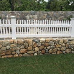 2' Solid Stain 'White' Cape Cod fence on a garden wall - Products