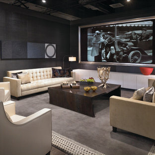 Example of a trendy home theater design in Chicago with gray walls