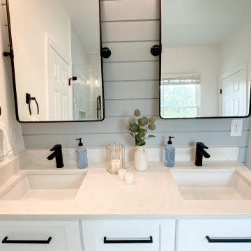 Bright Double Vanity with Framed Mirrors and Matte Black Fixtures