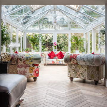Eclectic Conservatory with Elegant Wood Flooring in Hampton Wick, London