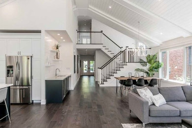 Mid-sized elegant wooden l-shaped wood railing staircase photo in Other with painted risers