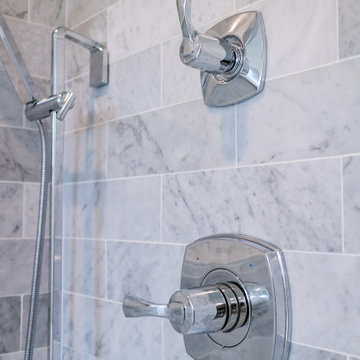 Polished Chrome Shower Controls with Marble Tile