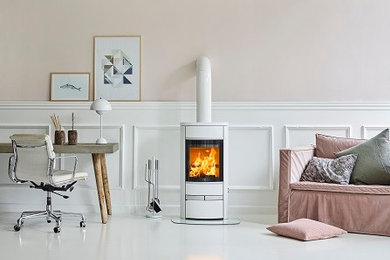 This is an example of a scandinavian living room in Other with a wood burning stove.