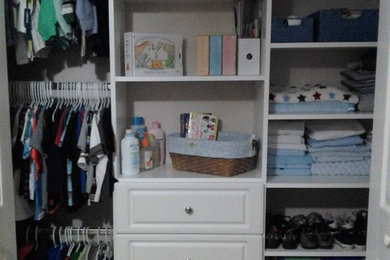 Example of a trendy reach-in closet design in Orlando