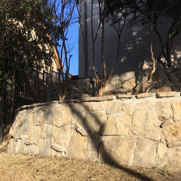 Stone wall repair, West Fort Worth.
