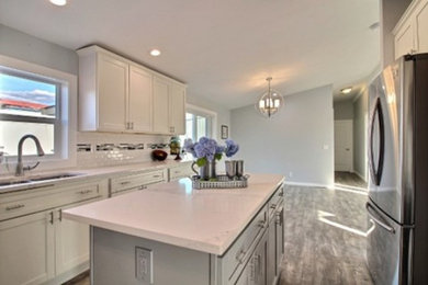 Example of a transitional kitchen design in Seattle
