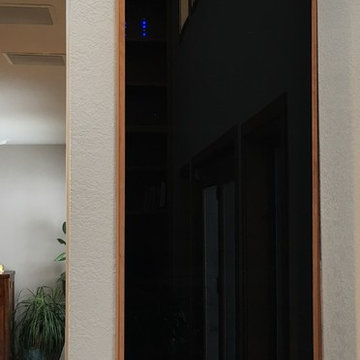 Custom recessed ventilated gear rack with smoked glass