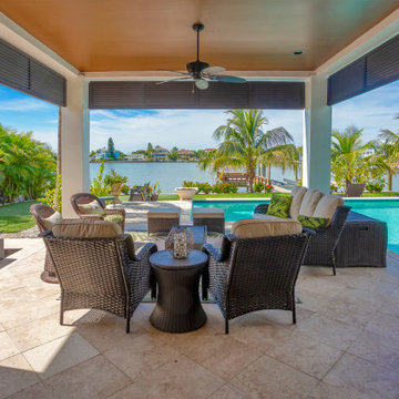 Serene Waterfront Lounge Overlooking a Private Tropical Oasis