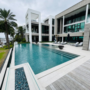 A Modern Poolscape with Spa and Fire Features