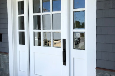 Beach style entryway photo in New York