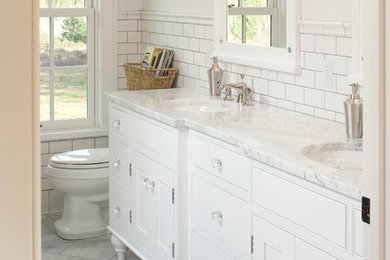 Example of a mid-sized classic master white tile and subway tile ceramic tile bathroom design in Seattle with an undermount sink, white cabinets, white walls, marble countertops, white countertops and beaded inset cabinets