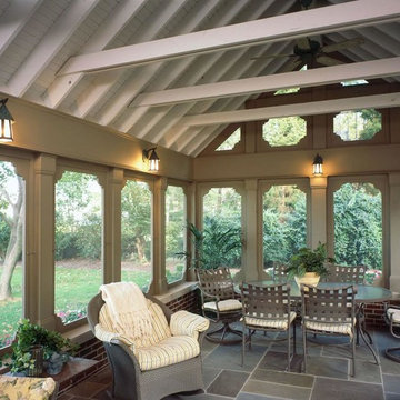 Screened Porch with lake views, vaulted ceiling and bluestone floor