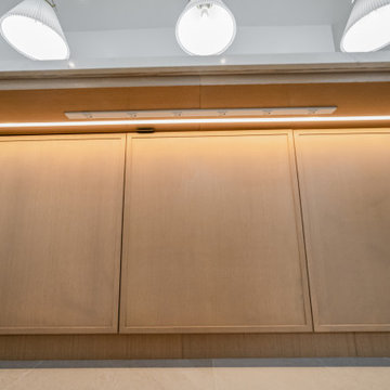 Straight-On View of Custom Island with Floating Cabinet Feel