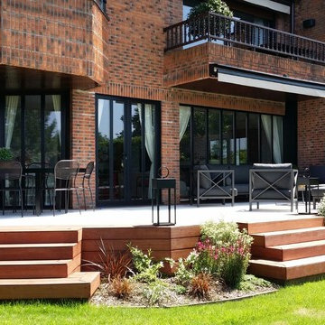 Terraza en porche de chalet.