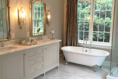 Large elegant master gray tile, white tile and ceramic tile marble floor bathroom photo in Atlanta with recessed-panel cabinets, beige cabinets, granite countertops, beige walls and an undermount sink