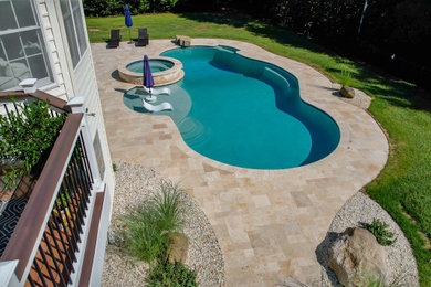Inspiration for a tropical pool remodel in Baltimore